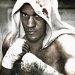 Fight Night Champion key art of boxer Andre Bishop in a hooded towel with wrapped fists